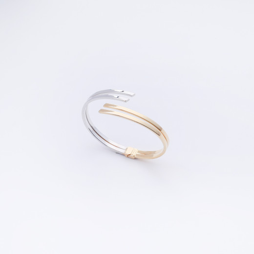 Stylish curved gold and silver bracelet